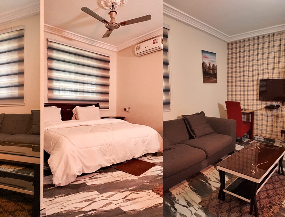 GHS300 room with a bed, air conditioner, TV, wardrobe space and lounge seating