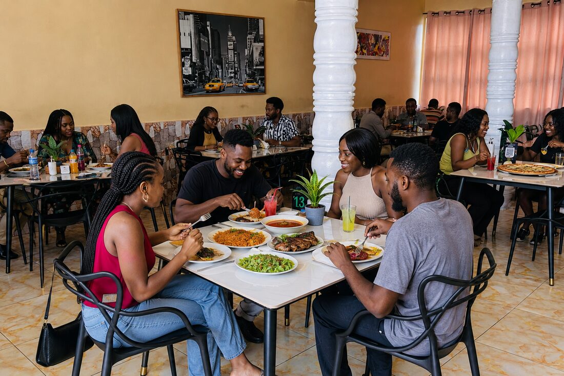 Guests sharing a meal at the G-Unit Plus restaurant with dishes and drinks on the table